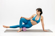© wedmoments.stock - Young woman training on white isolated background. Fitness, wellness and active lifestyle concept.