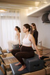 © Olma Studio/Stocksy - Pregnant woman performing pilates