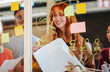 © VICTOR TORRES/Stocksy - Creative team brainstorming with colored sticky notes