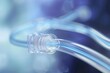 © juliars - Close up of transparent medical tubes joined by a connector, suggesting advanced medical technology in a modern hospital environment