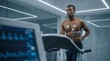 © PureVisualsFrame - Fit male athlete running on a treadmill inside a modern laboratory during cardiovascular and metabolic testing with chest and limb monitoring electrodes for performance analysis