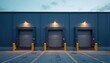 © Pete - Three industrial loading docks with security posts sit closed at a distribution center building. Exterior view shows closed roll-up doors under lights at twilight, highlighting empty warehouse gates.