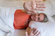 © Tatyana Gladskih - Happy Woman Wakes Up in the morning in bed at bedroom