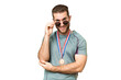 © luismolinero - Young handsome blonde man with medals over isolated chroma key background with glasses and happy