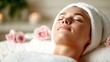 © Dulemegapixel - A serene spa scene featuring a peaceful woman enjoying a pampering treatment, surrounded by delicate roses and flickering candles, embodying tranquility, self-care, and wellness.