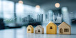 © sam richter - Wooden house models are placed in front of a futuristic graph overlay and a blurred city skyline.