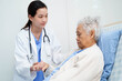 © Pakawadee - Asian doctor checking and treat elderly woman patient health in hospital.