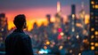 © mila103 - Young caucasian male admiring city skyline at sunset.