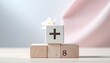 © Zucc - Wooden blocks with plus sign and number eight, symbolizing addition and growth.
