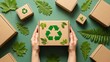 © sajibul35 - Hands holding eco-friendly cardboard box with green recycling symbol surrounded by leaves and boxes on green background