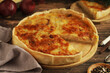 © nastyakamysheva - A traditional dish of Britisch cuisine - Onion and cheese pie