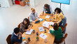 © Artcore Studio/Stocksy - Team working together in a meeting