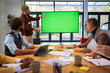© Artcore Studio/Stocksy - Team meeting - green screen