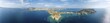 © Moritz Wolf/imageBROKER - Aerial view, sailing catamaran in a bay on the Turquoise Sea, panorama of the island of Schinoussa, Small Cyclades, Greece