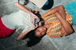 © Stock Latino - Diverse friends capturing memories with vintage camera and music