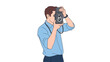 © renny - Man in light blue shirt taking a picture with a twinlens reflex camera