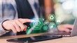 © chaylek - environmental analyst uses AI technology to monitor CO2 emissions on tablet, supporting sustainability strategies, carbon reduction, green innovation, data-driven environmental management systems.
