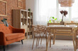 © Pixel-Shot - Interior of dining room with table, sofa and shelf unit