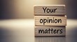 © Lutfa - Stacked wooden blocks with the words your opinion matters written on them