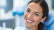 © mila103 - Smiling caucasian female adult at dentist's office showing healthy teeth.