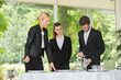 © auremar - manager training waiting staff to set table