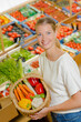© auremar - Woman holding up her shopping basket