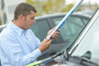 © auremar - portrait of man changing car wipers