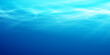© vik_y - Realistic underwater ocean view with sunlight rays penetrating blue water surface, creating natural ripples and bubbles in deep sea environment perfect for summer designs