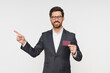 © InsideCreativeHouse - Hand, pointing and businessman with credit card for finance, bank and money payment isolated. Portrait of happy corporate employee able to buy or pay bills, retail shopping or debt with salary
