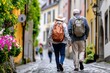 © dashtik - Senior friends exploring charming european village on a sunny day