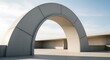 © Grafient - Minimalist concrete arch structure against a clear sky, architectural design element, abstract modern building exterior