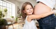 © BillionPhotos.com - Happy child holding belly of the pregnant mother