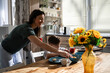 © Zoran Jesic - Mother and child enjoying family breakfast in sunny kitchen