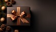 © Matt - a sophisticated dark gift box tied with a brown ribbon ready for a special occasion