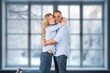 © BillionPhotos.com - Young adult happy couple hug