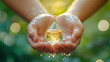© khemthong - Hands holding clean water drop,world water day,hand sanitizer and hygiene