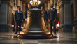 © Murda - Four men in suits standing behind a large bell inside a grand building.