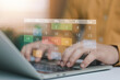 © ภัทรชัย รัตนชัยวงค์ - Online calendar management concept with virtual monthly schedule over laptop keyboard. Business appointment planning, deadline tracking, time organization and digital productivity system.