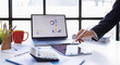 © David - Analyst woman working with information database to analyze marketing and sales data. Business analytics dashboard with charts, metrics, and KPIs concept.