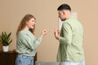 © Pixel-Shot - Young couple quarreling in living room