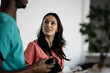 © Zoran Jesic - Female nurse communicating with medical professional team