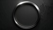 © IKetut - Metallic circular frame on dark textured background viewed straight on