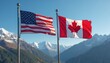 © miss irine - American and Canadian flags flutter against a clear blue sky with snow-capped mountains in the background. The flags symbolize national pride and neighboring countries sharing vast landscapes.