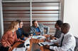 © peopleimages.com - Office, manager and business people in meeting for finance review, investment strategy and planning. Corporate team, laugh and man with graphs for company revenue, financial report or budget proposal
