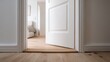 © Pixelzone - Open white interior door in a minimalist home with wooden floorboards and blurred bedroom background