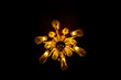 © Luiz Leite - Lustre de teto dentro de sala escura.