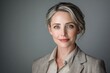 © Oleksandr - Professional businesswoman headshot portrait with neutral backdrop and studio lighting