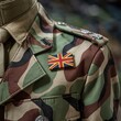 © Zander - Detailed Union Jack Flag Patch on Camouflage British Army Uniform Symbolizing United Kingdom National Security, Military Service, and Heritage