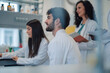 © Zamrznuti tonovi - Medical students and scientists collaborating during lab research