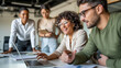 © KEYA - Collaborative team meeting in a modern office environment with diverse professionals